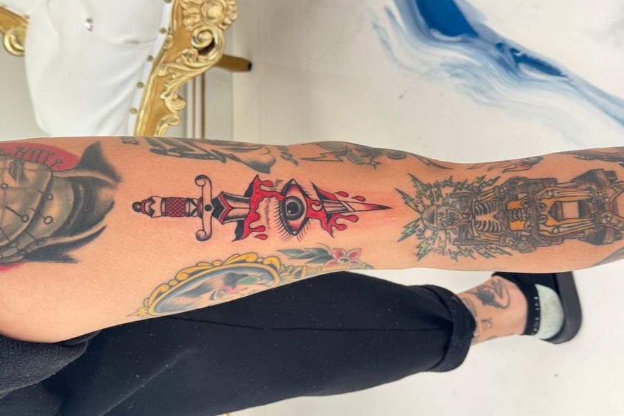 Spider Web Tattoo on Knee Meaning
